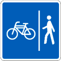 Vía peatonal adjunta a vía ciclista